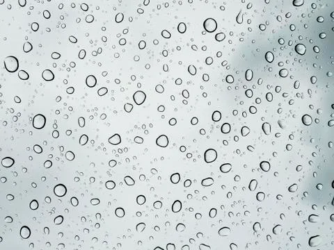 Selective focus water drops on the windshield after rain. Stock Photos
