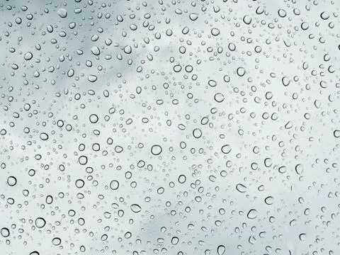Selective focus water drops on the windshield after rain. Stock Photos