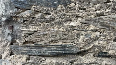 Selective focus weathered old stone texture Stock Footage 344878795