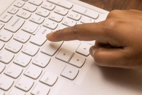 Selective focus of working on a computer keyboard. Stock Photos