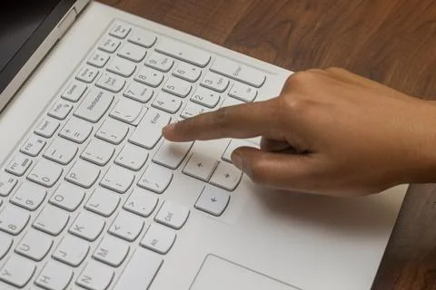 Selective focus of working on a computer keyboard. Stock Photos