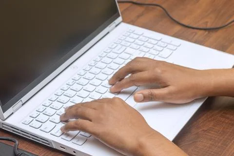 Selective focus of working on a computer keyboard. Stock Photos