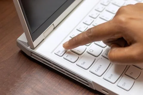 Selective focus of working on a computer keyboard. Stock Photos