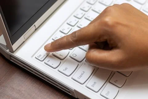 Selective focus of working on a computer keyboard. Stock Photos