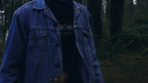 Selective focus on young hipster man in sweater and jeans jacket standing in the 스톡 동영상 108731547