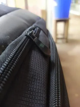 Selective focus on zip of a bag blur background Stock Photos