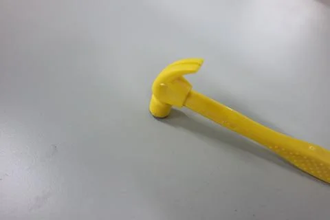 Selective focused, closeup view of toy hammer made from plastic Foto stock