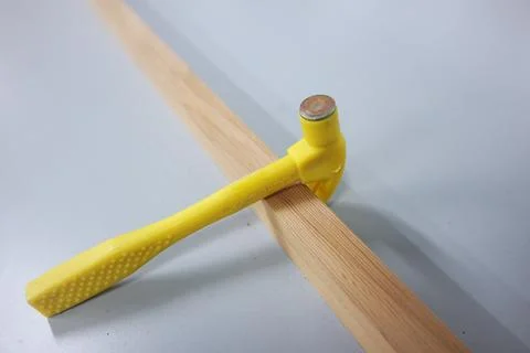 Selective focused, closeup view of toy hammer made from plastic Stock Photos