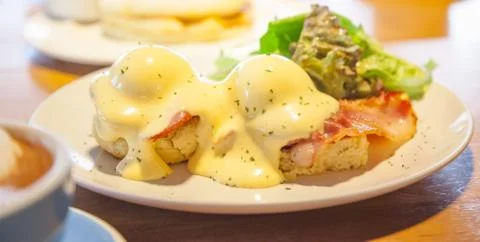 Selective Focused Eggs Benedict, a sandwich consists of 2 halves of English m Stock Photos