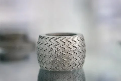 Selective Laser Melting. Object printed on metal 3d printer close-up. Stock Photos