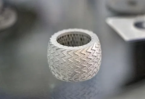 Selective Laser Melting. Object printed on metal 3d printer close-up. Stock Photos