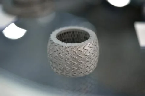 Selective Laser Melting. Object printed on metal 3d printer close-up. Stock Photos
