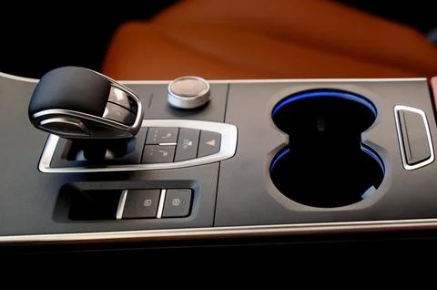 Selector automatic transmission with leather in the interior of a modern car. Stock Photos