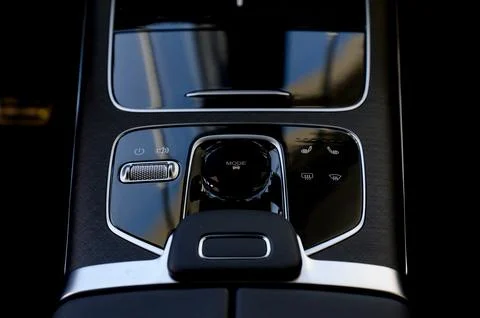 Selector automatic transmission with leather in the interior of a modern car. Stock Photos