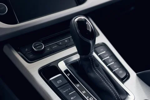 Selector automatic transmission with perforated leather in the interior of a  Stock Photos