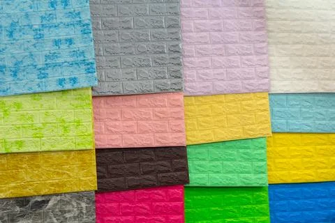 Self-adhesive 3D wall panel on the showcase of a hardware store Stock Photos