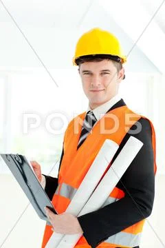 Self-assured archticet holding a clipboard and blueprints Stock Photos