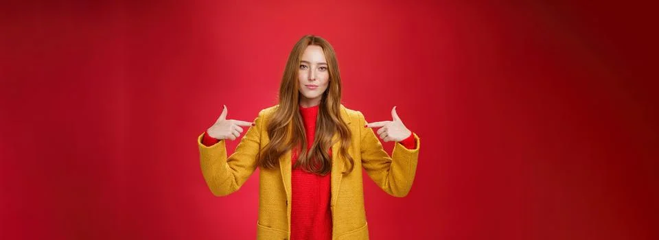 Self-assured assertive and optimsitic charming female entrepreneur with ginger Stock Photos