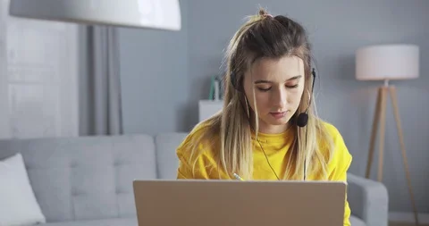Self-confident smart student practicing online courses, communicating with the Stock Footage 129936362