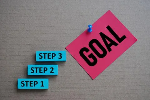 Self development concept. Words step 1 2 3, goal on wooden blocks and stickers 스톡 사진