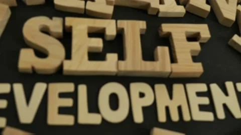 Self development, text words typography written with wooden letter, life an.. Stock Footage 231957937