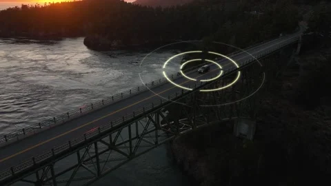 Self driving car navigating a dark bridge at sunset. Stock Footage 227669250