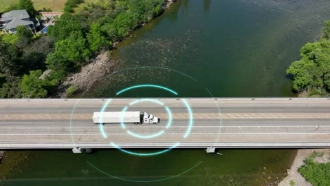 Self driving semi truck navigating a bridge to deliver its load. Stock-Footage 227669354