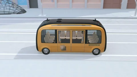 Self-driving shuttle bus driving through an intersection close to bus stop Video stock 111499159