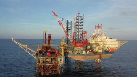 Self-elevating liftboat and oil production platform Stock Footage 128042552