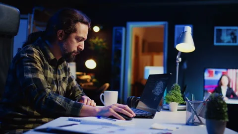 Self employed developer updating AI machine learning algorithm Stock Footage 263855835