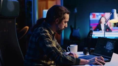 Self employed developer updating AI machine learning algorithm Stock Footage 263937300