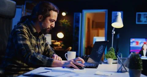 Self employed developer updating AI machine learning algorithm 写真素材