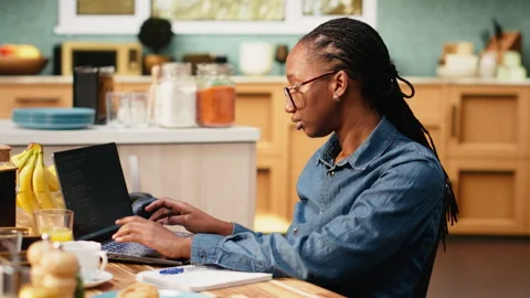 Self-employed woman telecommuting with generative artificial intelligence Stock Footage 344246678