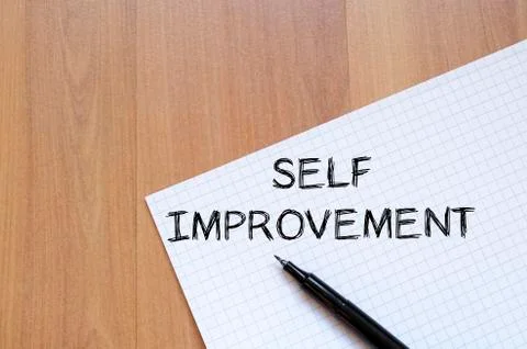 Self improvement write on notebook Stock Photos