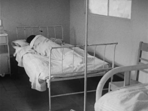 Self induced abortion is performed in the third world in the 1960s. Stock Footage 75319954