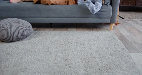 Self isolation concept. Young relaxed beautiful blonde woman scrolling feeds on Stock Footage 129273963