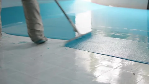 Self-leveling blue epoxy floor Stock Footage 149389751