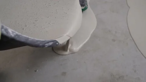 Self-leveling epoxy. Leveling with a mixture of cement floors. Construction Stock Footage 168331765