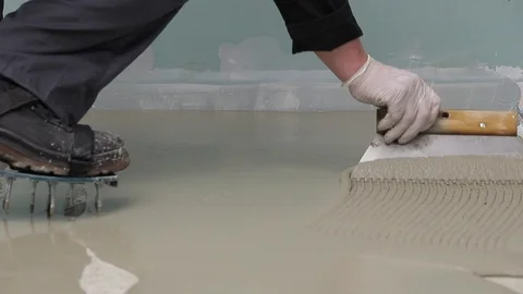 Self leveling screed - spreading Stock Footage 111939090