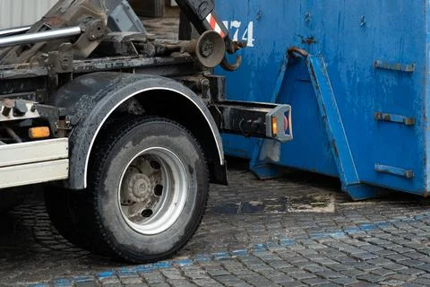 Self Loading container with heavy construction debris, including broken bri.. Stock Photos
