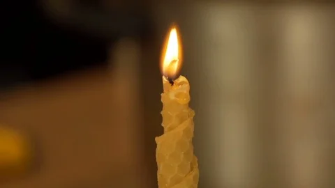 Self made wax candle burning Stock Footage 74057251