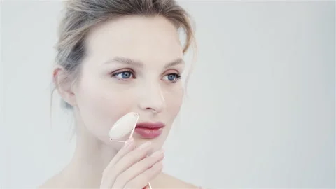 Self-massage. Rollerball for the face. Stock Footage 153746645