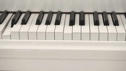 Self-Playing White Piano Without Pianist. Playing Piano Itself. Stock Footage 98585676