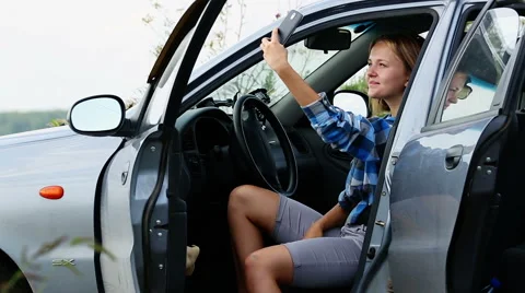 Self-portrait in the car Stock Footage 44455710