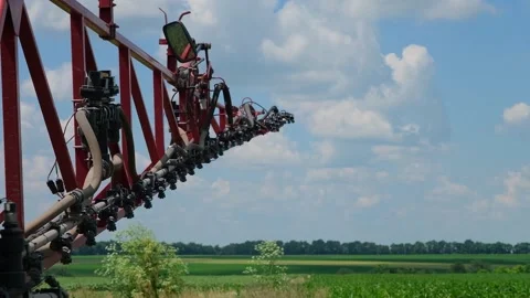 Self-propelled sprayer applies crop protection products to corn Stock Footage 166616545