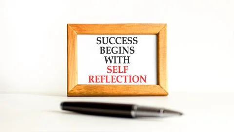 Self reflection symbol. Concept words Success begins with self reflection o.. Stock Photos