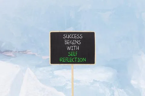 Self reflection symbol. Concept words Success begins with self reflection o.. Stock Photos
