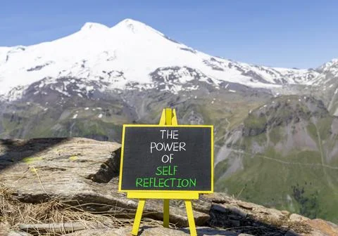Self reflection symbol. Concept words The power of self reflection on beautif Stock Photos