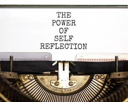 Self reflection symbol. Concept words The power of self reflection typed on o Stock Photos