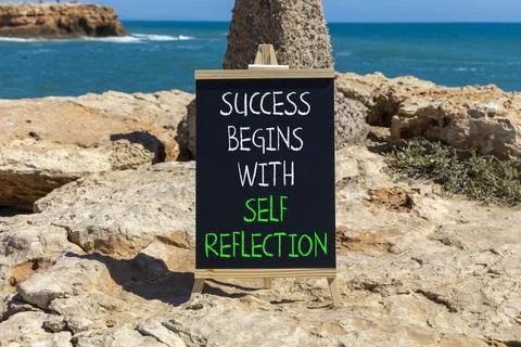 Self reflection symbol. Concept words Success begins with self reflection o.. Stock Photos